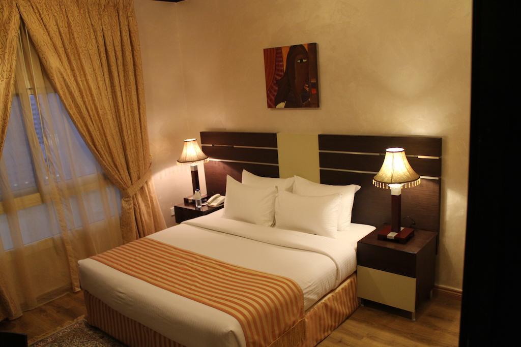 Boulevard City Suites Hotel Apartments Dubái Habitación foto